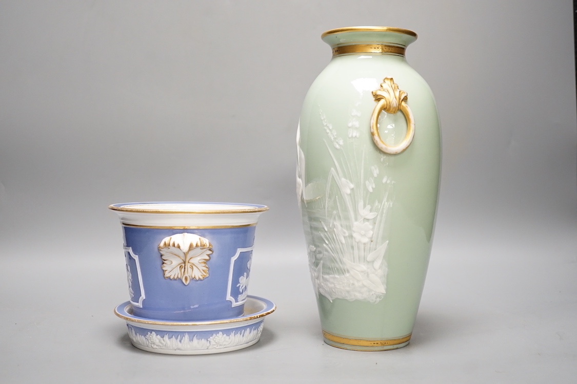 A Royal Worcester pate sur pate 'heron' vase and an early 19th century plant pot and under dish. Tallest 25cm